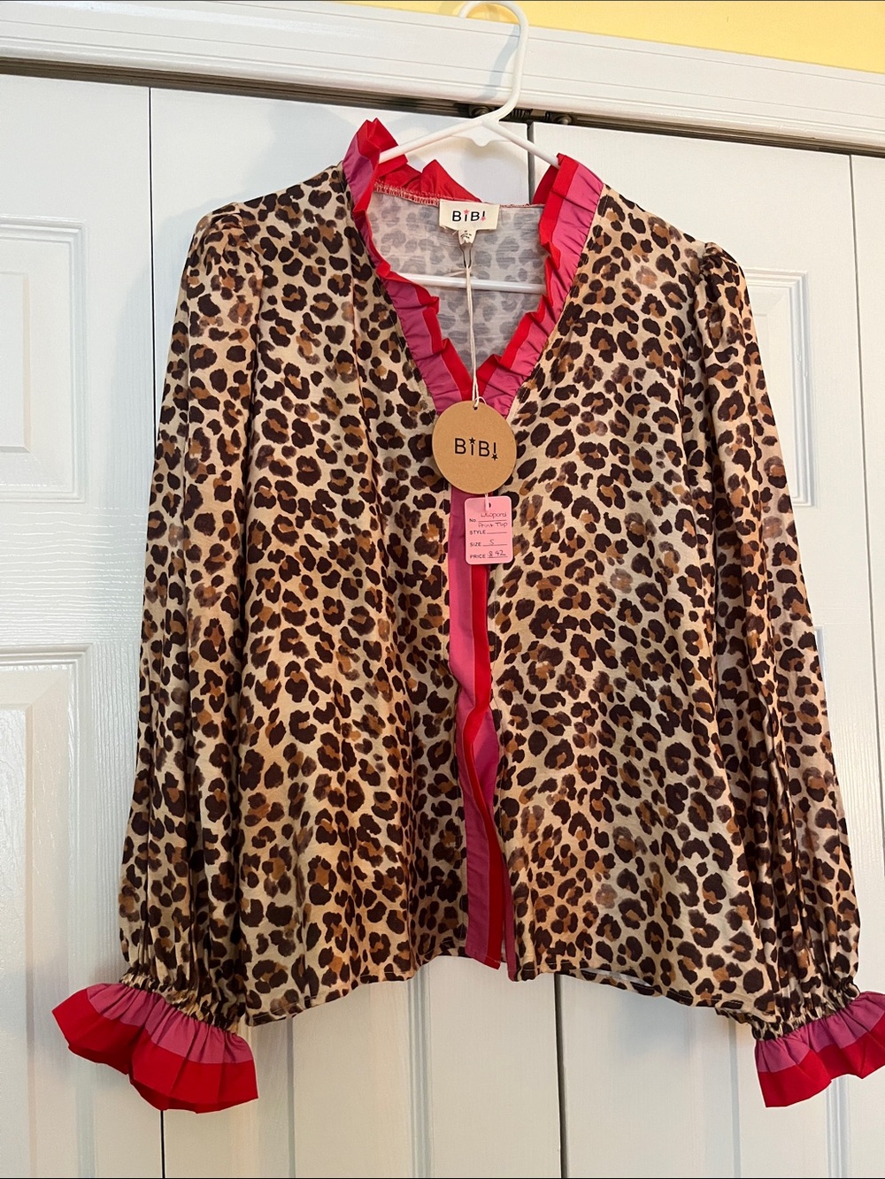 BiBi Leopard Print snap button shirt with Pink Ruffle Trim